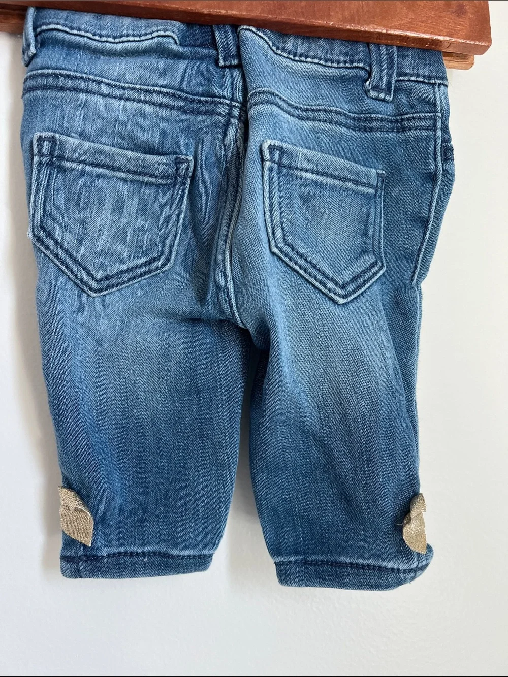 OshKosh B'gosh | Baby Blue Denim Jeans with Gold Bow Hem Detail Size 3 Months